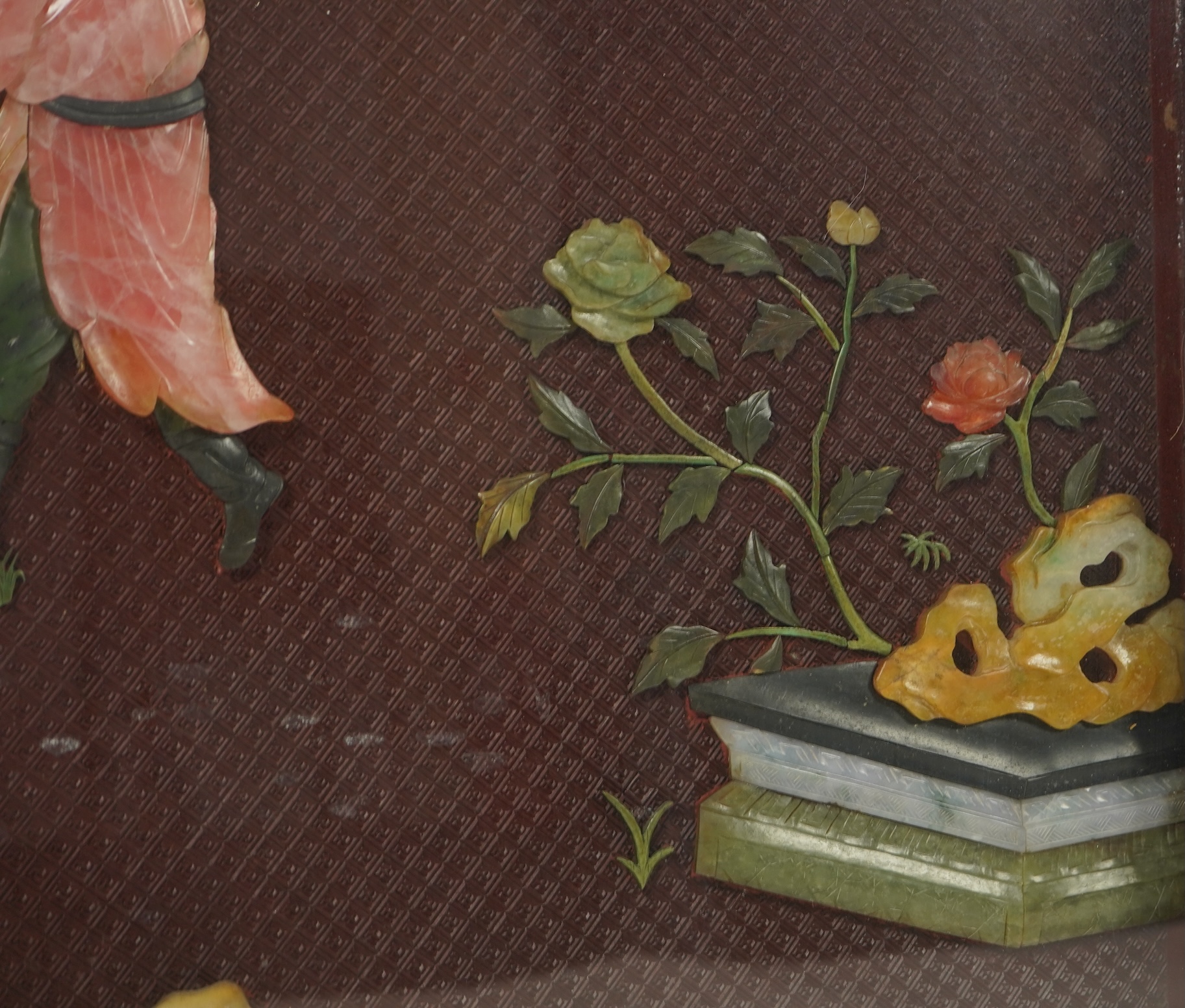 A Chinese carved cinnabar lacquer and hardstone mounted panel, early 20th century